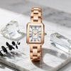 Reloj HANNAH MARTIN LUPE oro rosa sobre mármol blanco con prismas de cristal