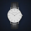 Video de detalle del reloj Hannah Martin Nomita Blanco Cuero Negro